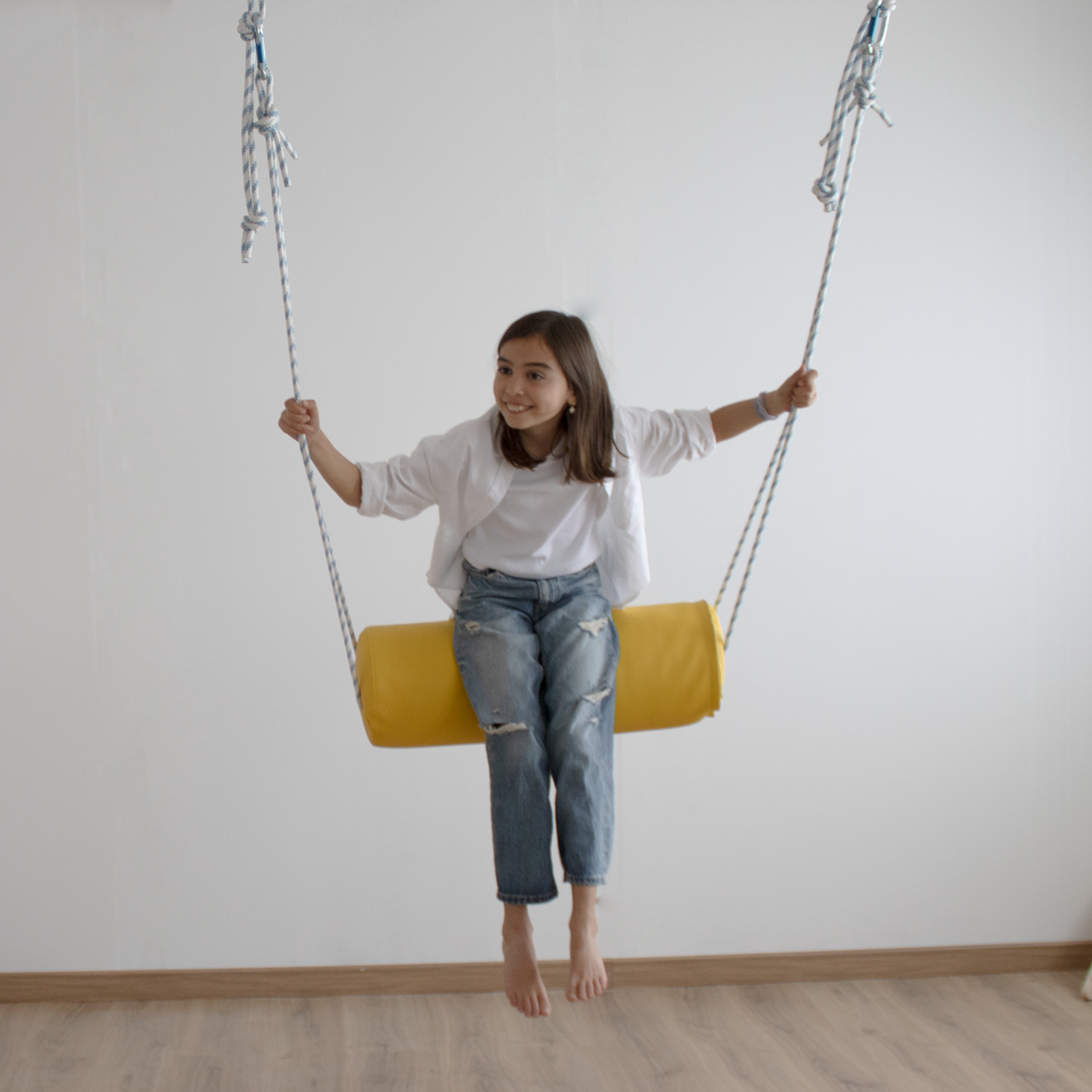 columpio-cilíndrico-amarillo