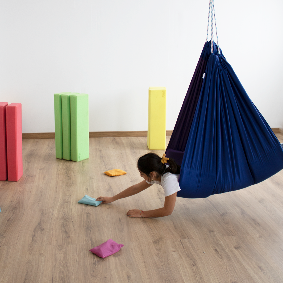 hamaca-extensora-y-saquitos-de-peso